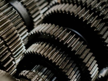 pexels-photo-7568427-7568427 Detailed close-up of metal gears inside a machine showcasing precision engineering.